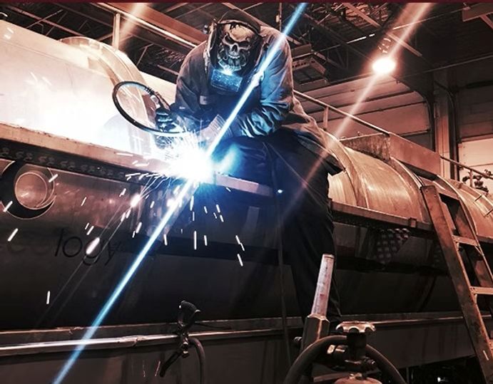 a certified trailer tech welding trailer repair